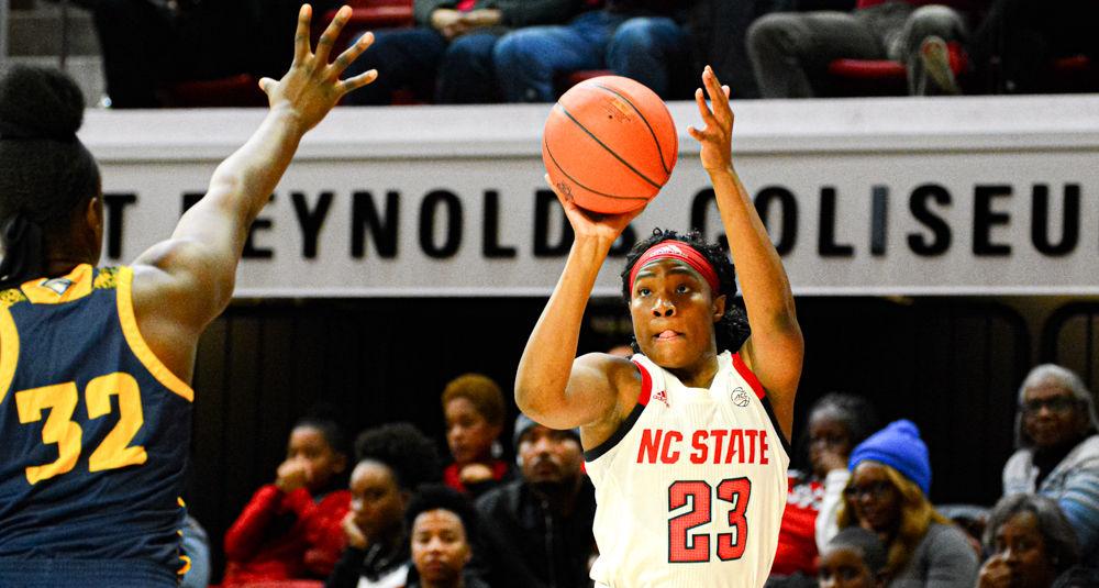 Redshirt senior guard Grace Hunter shoots against Chattanooga on Thursday, Dec. 19, 2019 at Reynolds Coliseum. Hunter scored 14 points as the Wolfpack won 74-38.