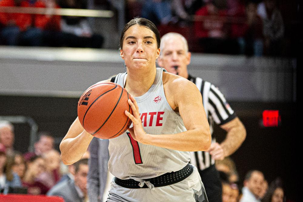 Senior guard Aislinn Konig passes against Florida State on Thursday, Jan. 16, 2020 at Reynolds Coliseum. Konig recorded 10 points and six assists as the Wolfpack won 68-51.