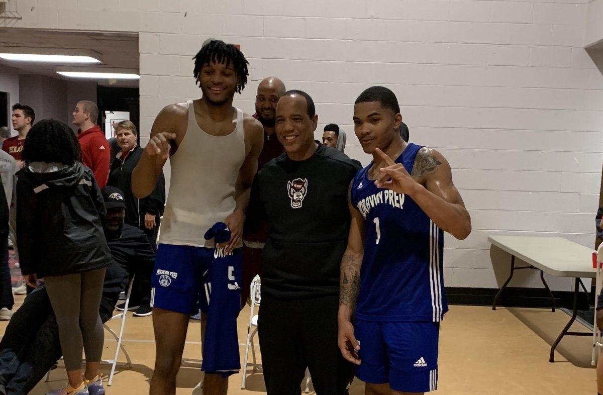NC State men's basketball 2020 recruits Shakeel Moore and Josh Hall stand with Pack head coach Kevin Keatts after Moravian Prep beat The Burlington School on Dec. 17, 2019.