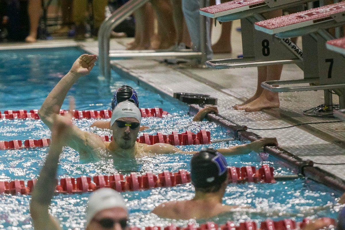 Senior Coleman Stewart places first in the 200 yard freestyle with a 1:38.37. The Wolfpack took down Duke with a 191-104 in Casey Aquatic Center.
