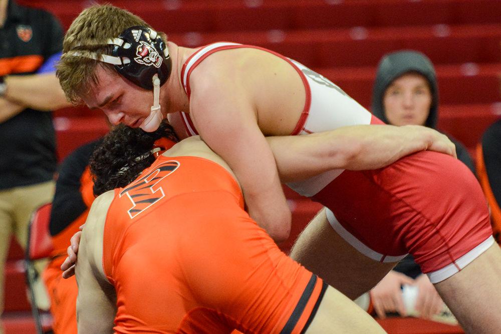 Thomas Bullard, a Redshirt Junior, grapples with his opponent in the match against the Princeton Tigers on Saturday, Jan. 11, 2020. In the 18-19 season, he earned All-ACC honors by making finals after starting as the #3 seed.