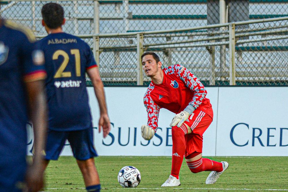 NCFC goalkeeper Alex Tambakis passes on Saturday, July 27, 2019 at WakeMed Soccer Park. Tambakis gave up two goals and registered one save in NCFC&#8217;s 4-2 win over Atlanta United 2.