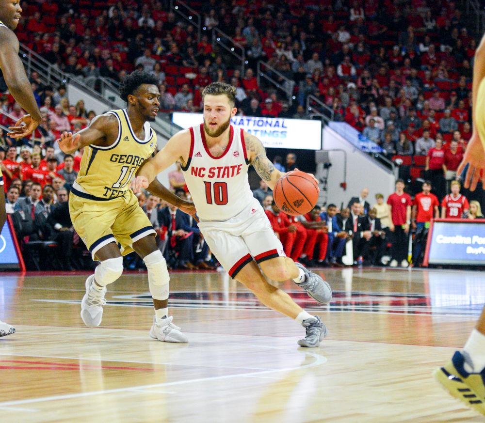 Junior guard, Braxton Beverly drives to the basket in PNC Arena on November 5, 2019. Beverly played 37 minutes with 11 points, four rebounds, and five assists in the Wolfpack&#8217;s 82-81 overtime loss to Georgia Tech.