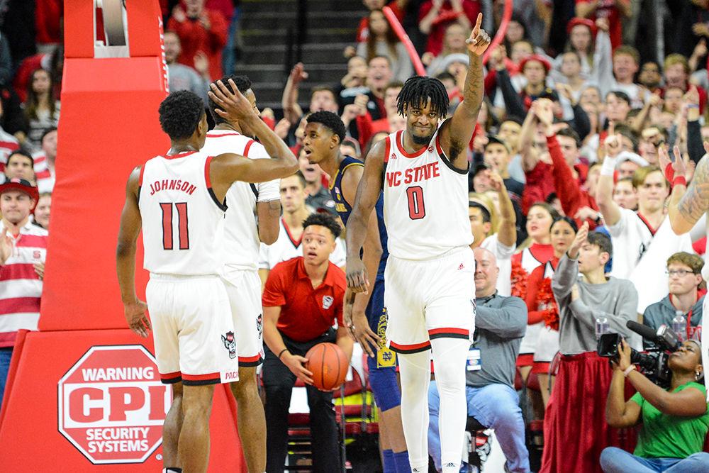 Redshirt junior forward DJ Funderburk celebrates in the second half during the game versus Notre Dame on Wednesday, Jan. 8, 2020. Funderburk scored 16 points and had 9 rebounds against the Fighting Irish. The Wolfpack came back from a deficit at halftime to beat Notre Dame 73-68.