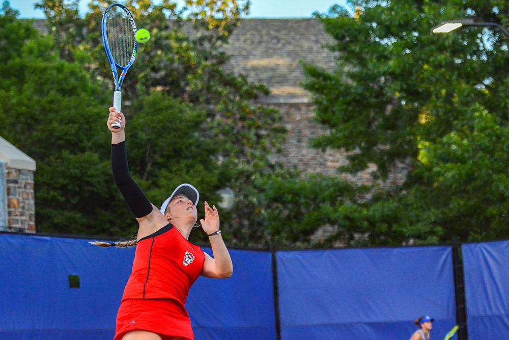 Sophomore Liz Norman returns a volley against Duke senior Kaitlyn McCarthy on Friday, May 10, 2019 at Ambler Tennis Stadium in Durham. Norman lost to McCarthy 6-3, 6-3 during the Wolfpack&#8217;s 4-0 overall loss to the Blue Devils.