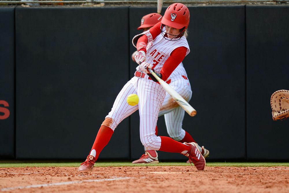 Sophomore outfielder Sam Russ hits the ball against Virginia Tech on Saturday, March 16, 2019 at Dail Softball Stadium. Russ went 1-2 with one double and one walk in the Wolfpack&#8217;s 12-1 loss to the Hokies.