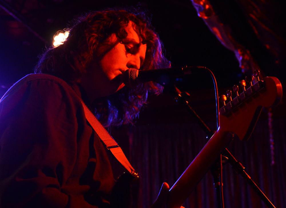 Truth Club's guitarist and lead singer sings into the microphone at the Double Barrel Benefit Concert at Kings on Saturday, Feb. 8, 2020.