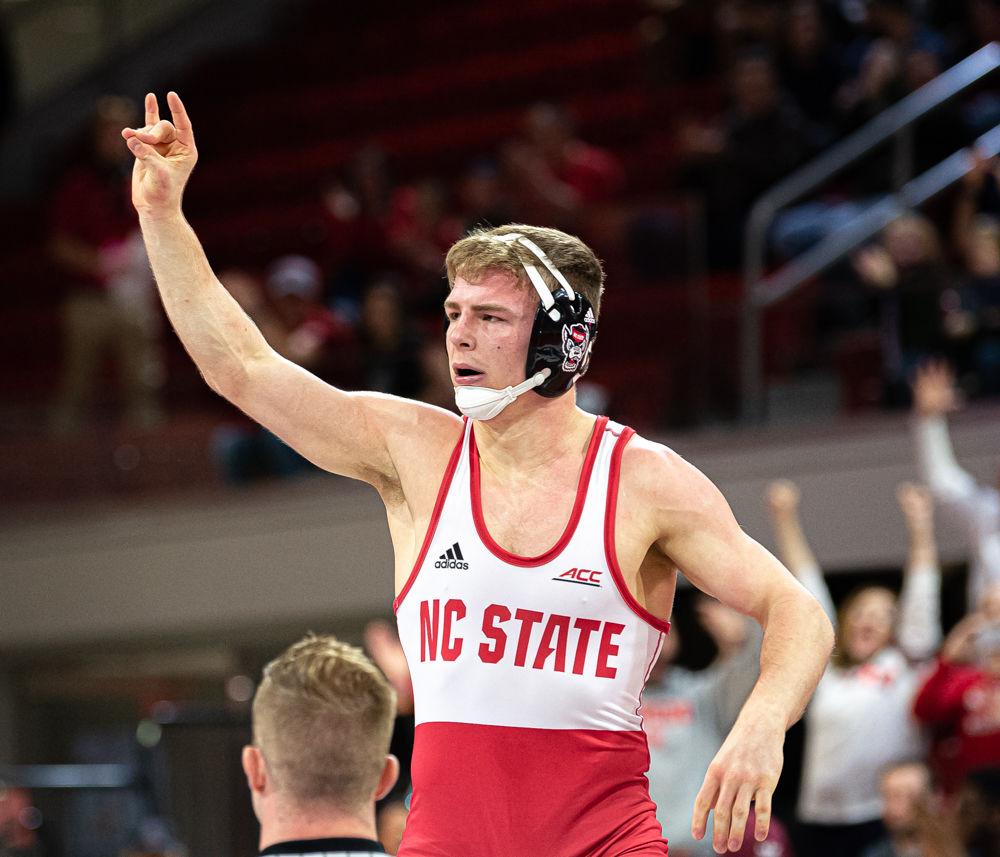 Redshirt junior Daniel Bullard celebrates winning his match against Princeton senior Kevin Parker on Saturday, Jan. 11, 2020 at Reynolds Coliseum. Bullard defeated Parker 6-0 by fall, helping the Wolfpack to a 29-12 dual win.