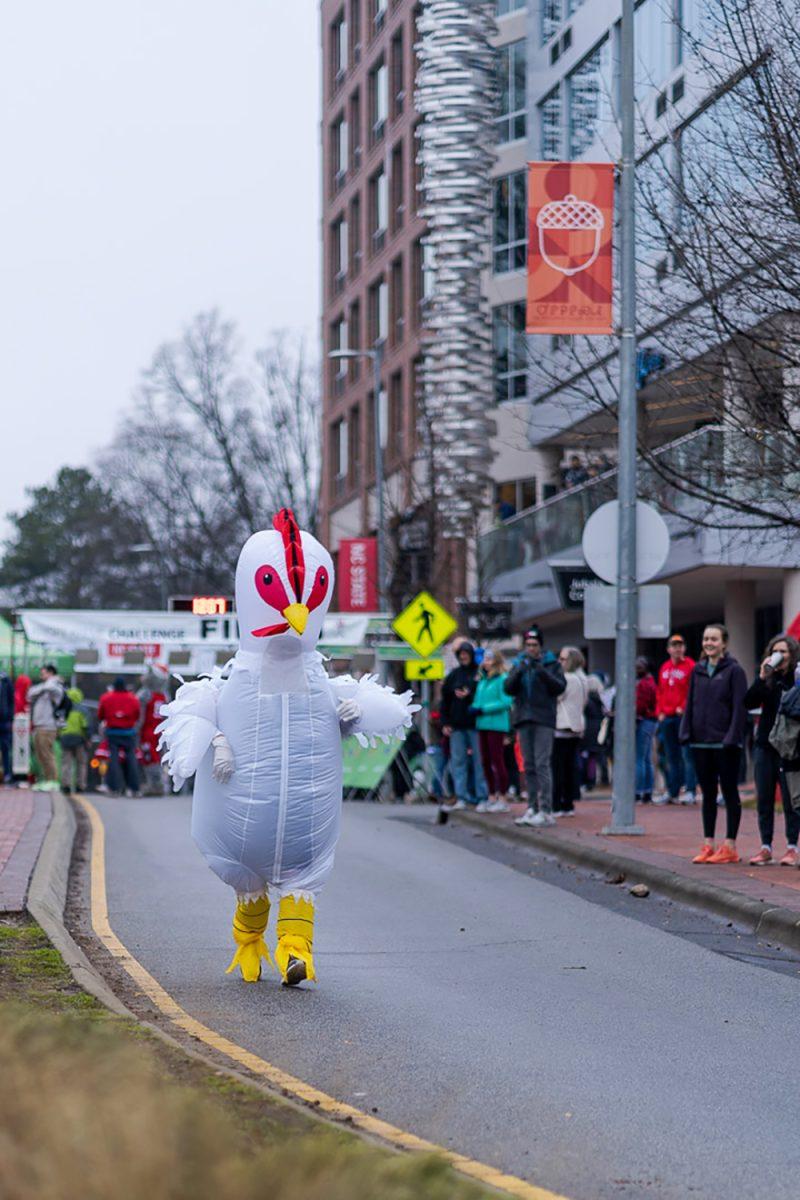A runner coming down the street during the first leg of the 2020 Krispy Kreme Challenge on Saturday, Feb. 1.