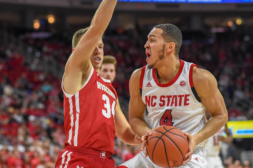 Sophomore forward Jericole Hellems looks to break through the Wisconsin defense on Wednesday, Dec. 4, 2019 in PNC Arena. Hellems scored 23 points against Wisconsin and was the Wolfpack's top scorer. The Wolfpack beat the Badgers 69-54.