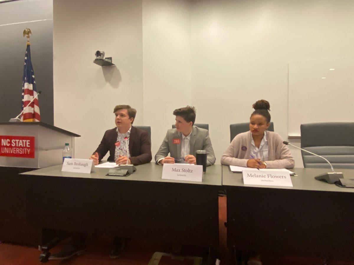 Sam Brohaugh, a third-year studying civil engineering, speaks at the student body president debate on Friday, Feb. 28, 2020 in Talley 4140, hosted by Student Media. To his right is Max Stoltz, a third-year studying parks, recreation and tourism management, and further right is Melanie Flowers, a third-year studying communication.