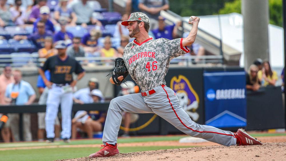 Sophomore pitcher Nick Swiney delivers the ball against ECU on Sunday, June 2, 2019 at Clark-LeClair Stadium in Greenville. Swiney pitched two and one-third innings, striking out five while giving up one hit and three walks. The Wolfpack lost 9-2.