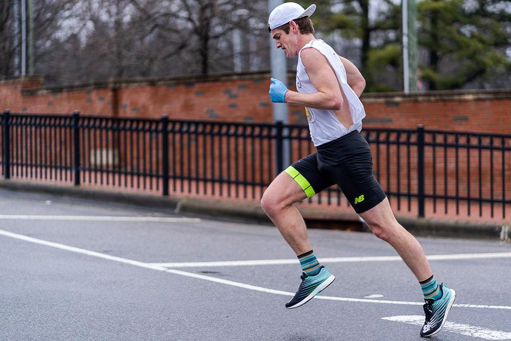 Stephen Rathbun, the winner of the 2020 Krispy Kreme Challenge, running towards the finish line on Saturday, Feb. 1.