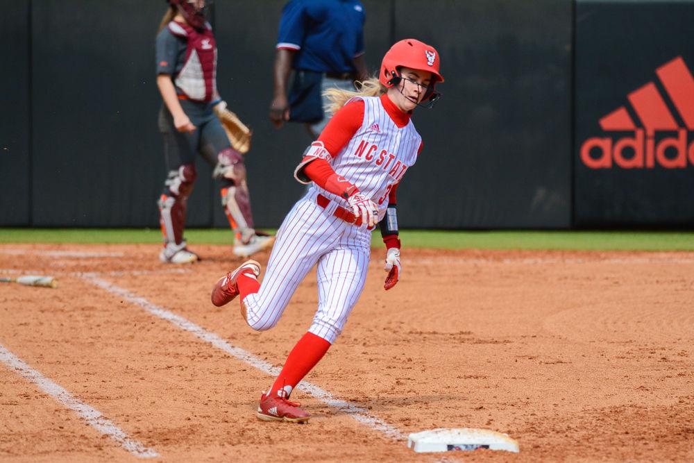 Sophomore outfielder Sam Russ rounds first base against Virginia Tech on Saturday, March 16, 2019 at Dail Softball Stadium. Russ went 1-2 with one double and one walk in the Wolfpack&#8217;s 2-1 loss to the Hokies.