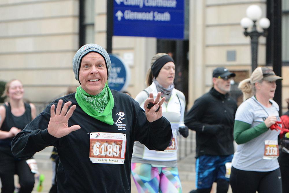 Todd Thornton runs with excitement during the Krispy Kreme Challenge on Saturday, Feb. 1, 2020.