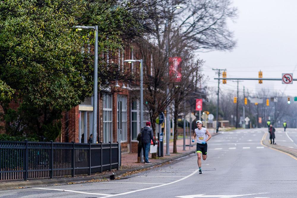 The winner of the 2020 Krispy Kreme Challenge, Stephen Rathbun, approaching the finish line on Saturday, Feb. 1.