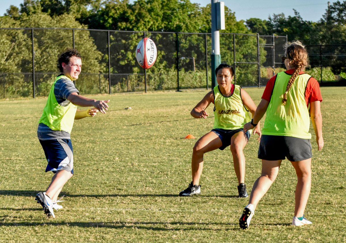 Women&#8217;s Club Rugby scrimmages against their teammates to practice effective passing methods the correct way to tackle on Tuesday, September 24, 2019.