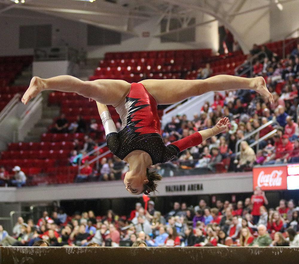 Emily Shepard performs her beam routine at Reynolds Coliseum on Feb. 1, 2020. The team scored a 49.125 on beam marking a career best. The Wolfpack defeated the Tar Heels 196.250-193.375, setting a season record score.