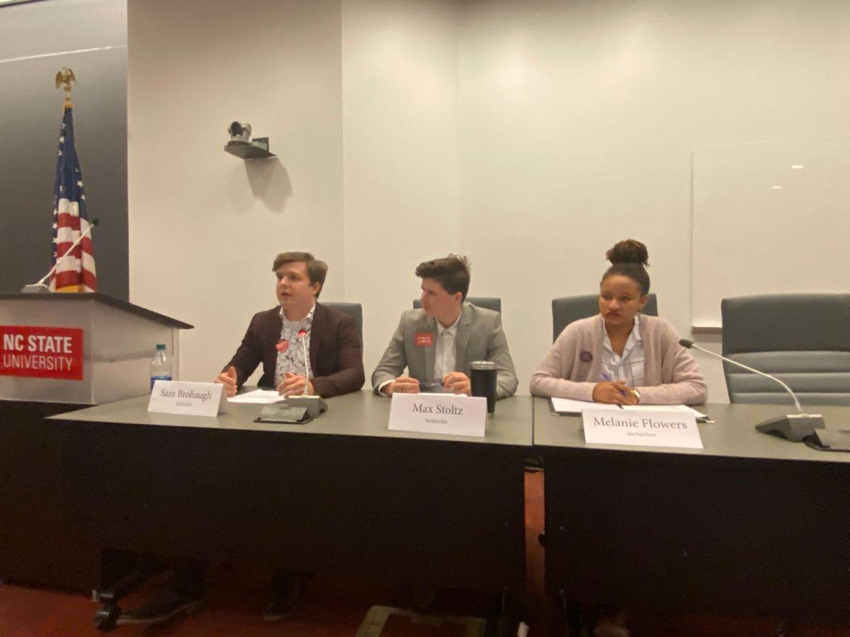 Sam Brohaugh, a third-year studying civil engineering, speaks at the student body president debate on Friday, Feb. 28, 2020 in Talley 4140, hosted by Student Media. To his right is Max Stoltz, a third-year studying parks, recreation and tourism management, and further right is Melanie Flowers, a third-year studying communication.