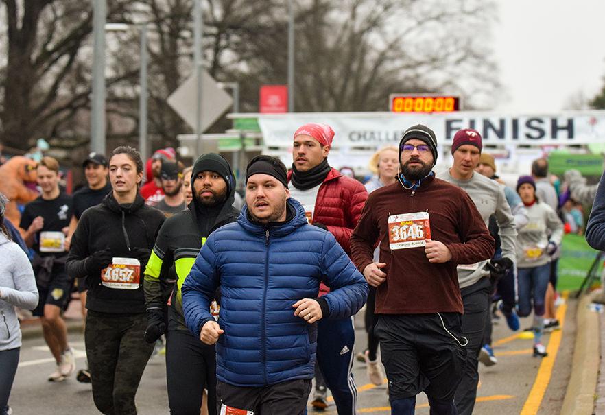 Krispy Kreme Challenge runners begin the race on Saturday, Feb. 1, 2020 in Raleigh, NC. The Challenge benefits the UNC Children's Hospital.
