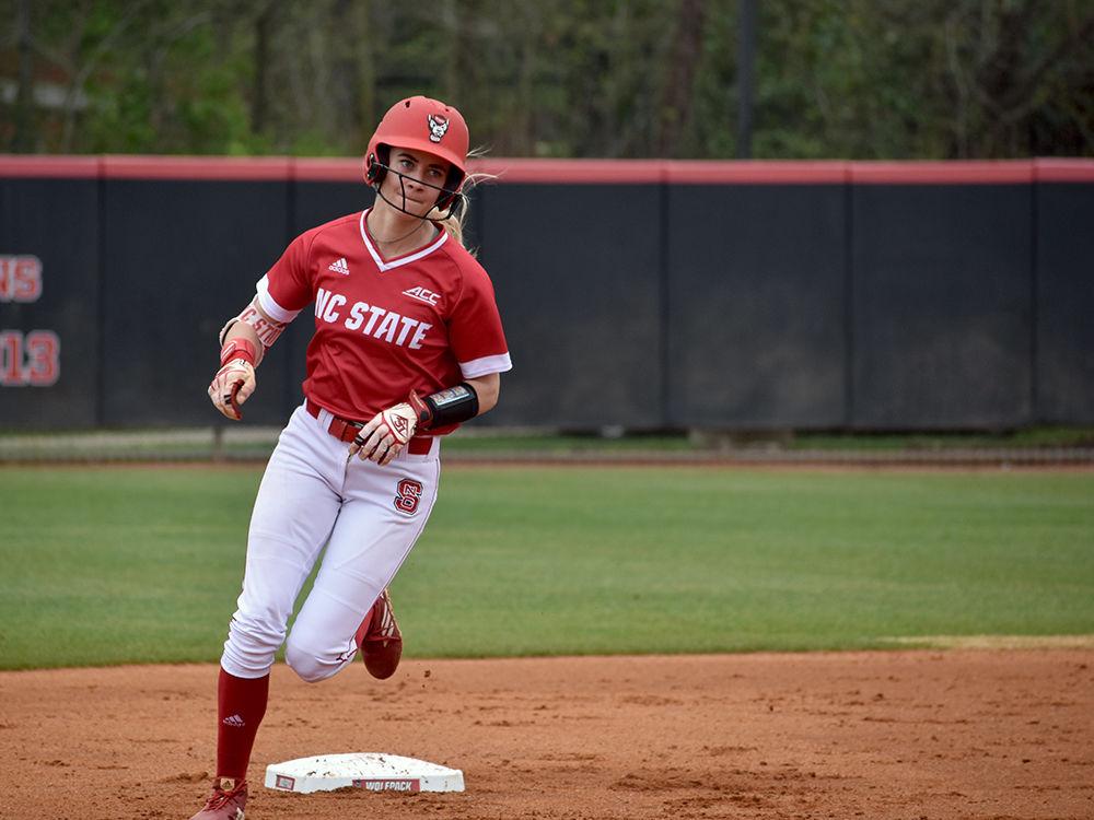 Sophomore outfielder Sam Russ rounds third base on April 7 at Dail Softball Stadium. Russ had one run scored as NC State lost to Syracuse 5-3.