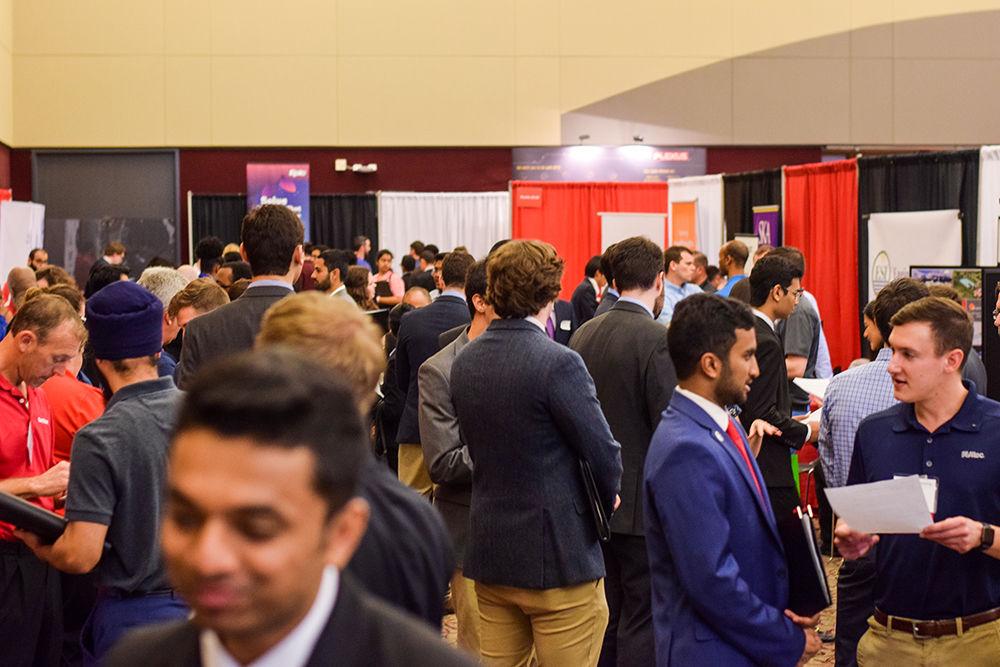Students attend the Engineering Career Fair on Wednesday, Feb. 5, 2020 at the McKimmon Center. The Career Fair helps students and attendees network with companies looking for employees and interns.