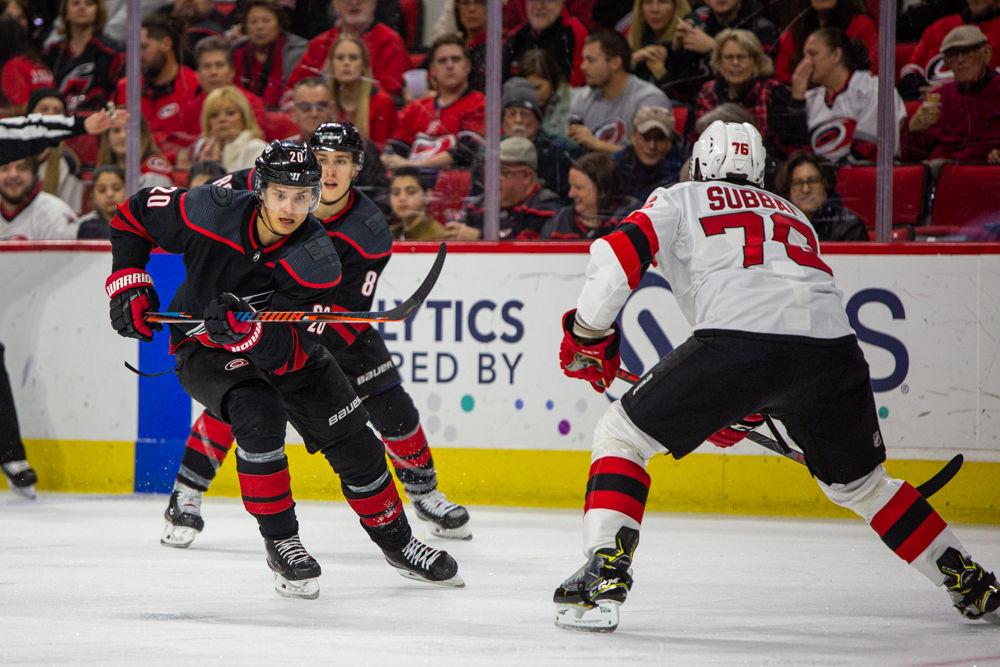 Hurricanes center Sebastian Aho chases the puck versus Devils defenseman P.K. Subban on Friday, Feb. 14, 2020 at PNC Arena. Aho had one assist in the 5-2 win over the New Jersey Devils.