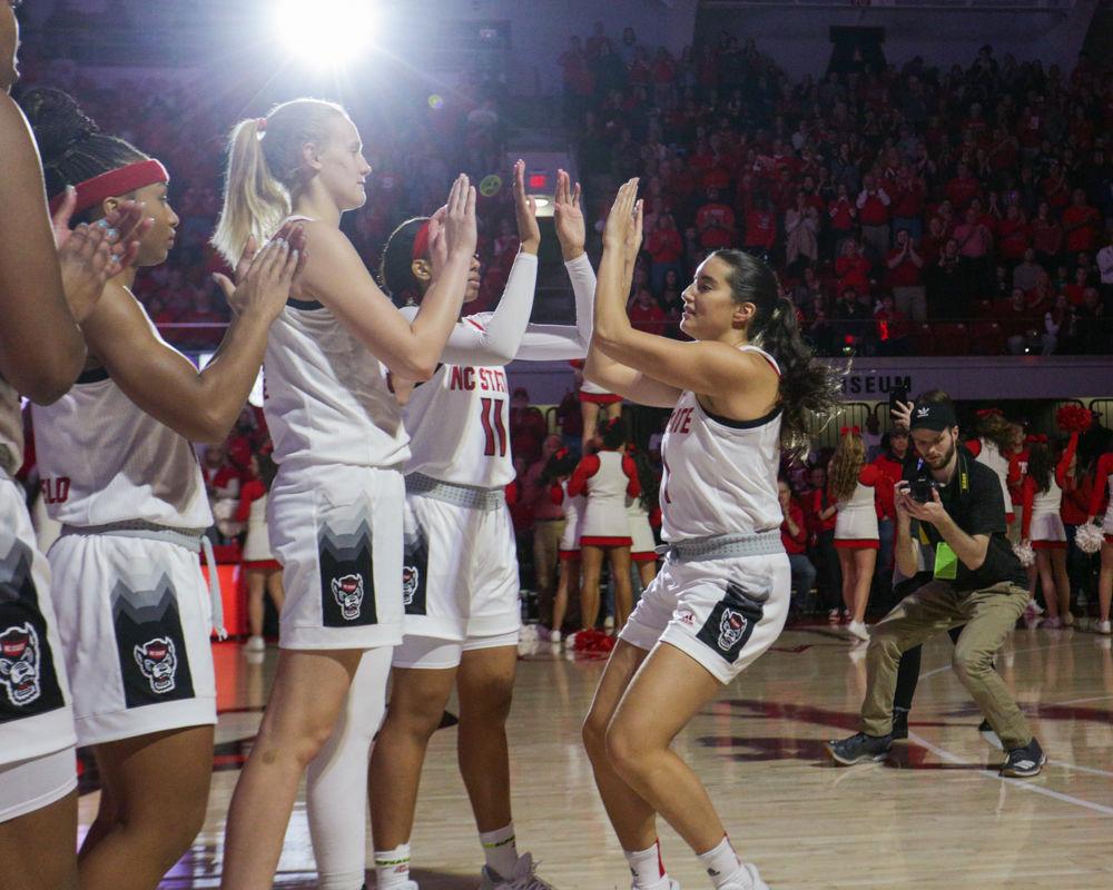 Senior guard Aislinn Konig meets the rest of the starting lineup on the court prior to the 76-68 win over UNC in Reynolds Coliseum on Sunday, Jan. 27, 2020.