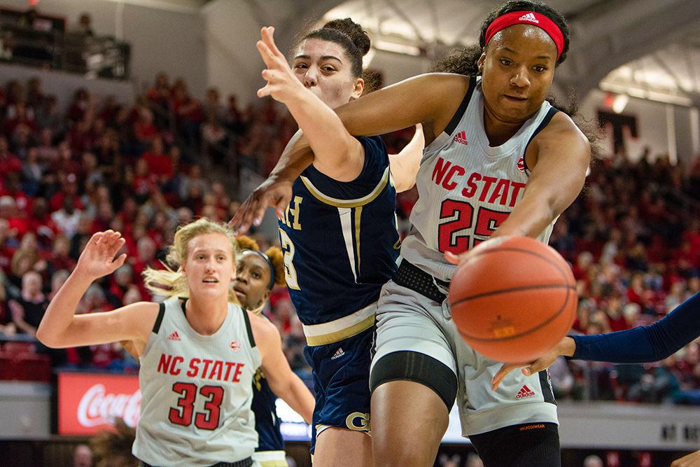 Junior forward Kayla Jones reaches for a loose ball against Georgia Tech on Sunday, Feb. 16, 2020 at Reynolds Coliseum. Jones scored 17 points as the Wolfpack lost 65-61.