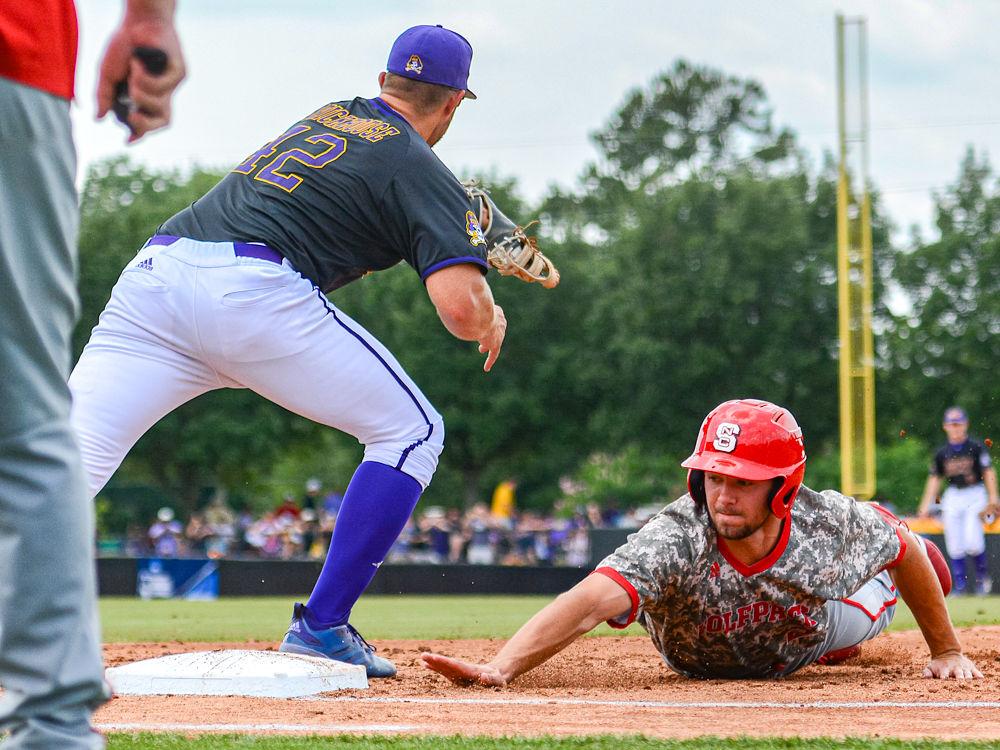 Sophomore outfielder Jonny Butler dives back to first base to avoid a pickoff by ECU on Sunday, June 2, 2019 at Clark-LeClair Stadium in Greenville. Butler went 0-3 with two strikeouts and one walk in the Wolfpack&#8217;s 9-2 season-ending loss.