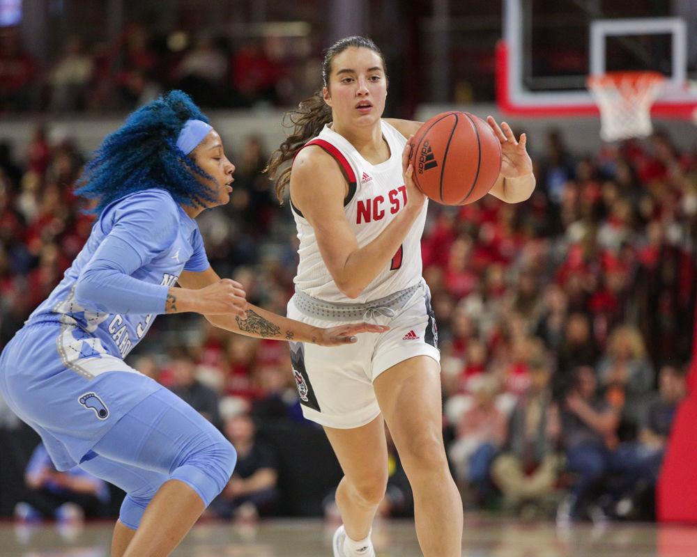 Senior guard Aislinn Konig passes the ball during the 76-68 win over UNC in Reynolds Coliseum on Sunday, Jan. 27, 2020.