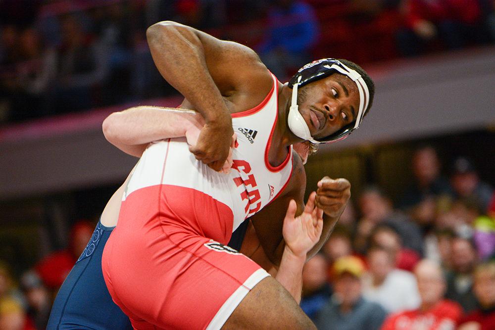 Deonte Wilson, a sophomore wrestling at 285 pounds, escapes from his opponent's grasp in the match against the UNC Tar Heels on Saturday, Feb. 7, 2020. In the 18-19 season, Wilson went 22-12 at heavyweight.