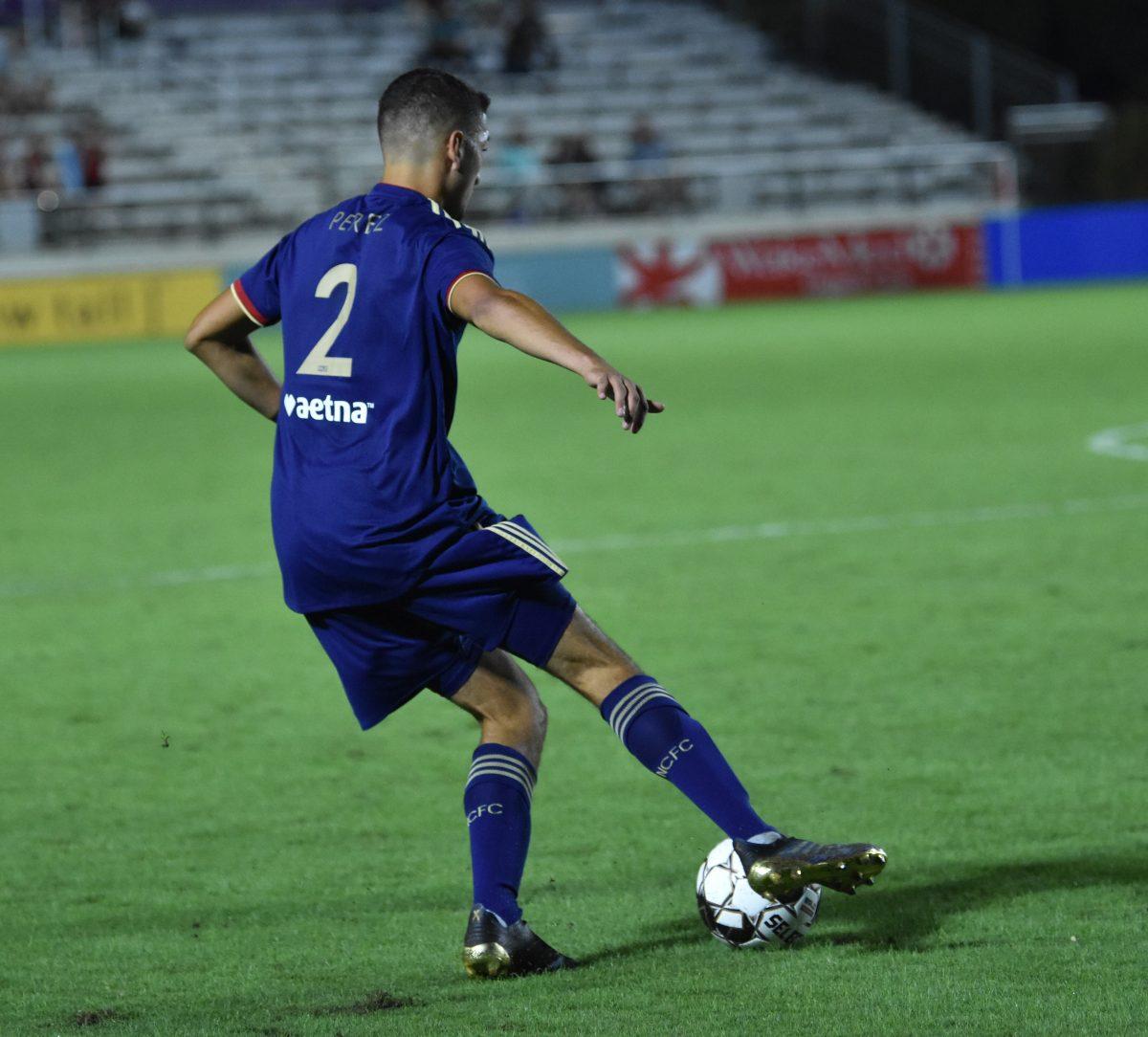 Manny Perez dribbles the ball during NCFC&#8217;s 3-1 win over the Ottawa Fury FC on Saturday Sept. 28, 2019 at WakeMed Soccer Park. Perez is a former Wolfpack men&#8217;s soccer player and recorded two assists after subbing on in the second half.