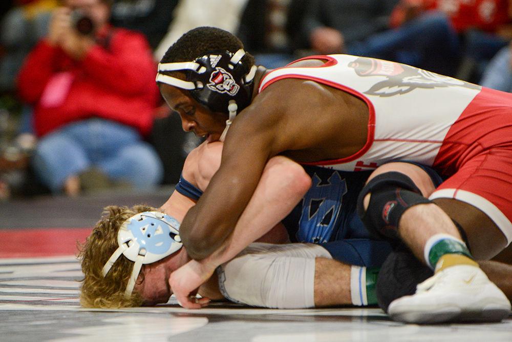 Tariq Wilson, a Redshirt junior wrestling at 141 pounds, keeps his opponent on the ground in the match against the UNC Tar Heels on Saturday, Feb. 7, 2020. In the 18-19 season, Wilson went 17-5, 8-2 in duals, and a perfect 10-0 in bonus point matches.