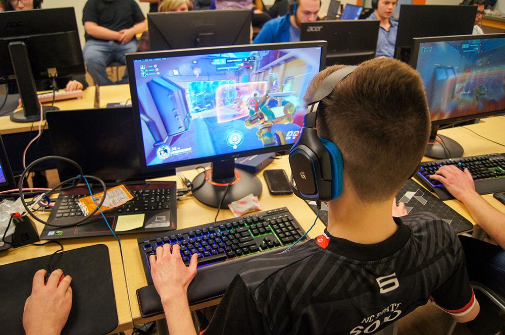 Patrick "SqiD" Miller, a sophomore majoring in electrical engineering plays Overwatch against UNC on Saturday, Feb. 29, 2020, at the Frank Porter Graham Student Union. The NC State Overwatch team won 3-1 over UNC Esports.
