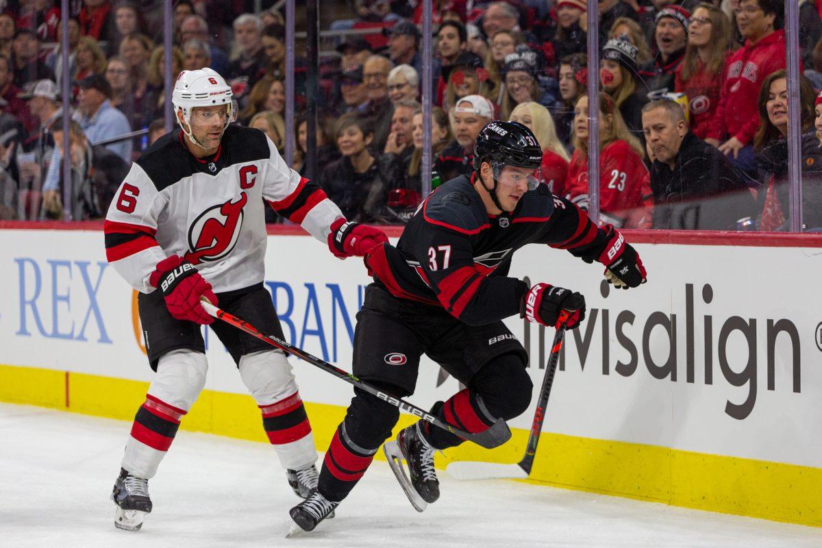Hurricanes right wing Andrei Svechnikov is chased by Devils defenseman Andy Greene versus the Devils on Friday, Feb. 14, 2020 at PNC Arena. Svechnikov had one goal on four shots in the 5-2 win over the New Jersey Devils.