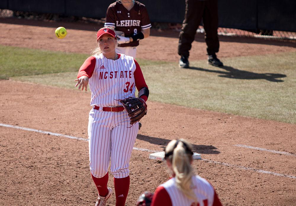 Skylar Johnston throws the ball to relief pitcher, Syndey Nester, after Lehigh gets a runner on first base on Friday, Feb. 28 at Dail Softball Stadium. NC State beat Lehigh 12-2 in only six innings.