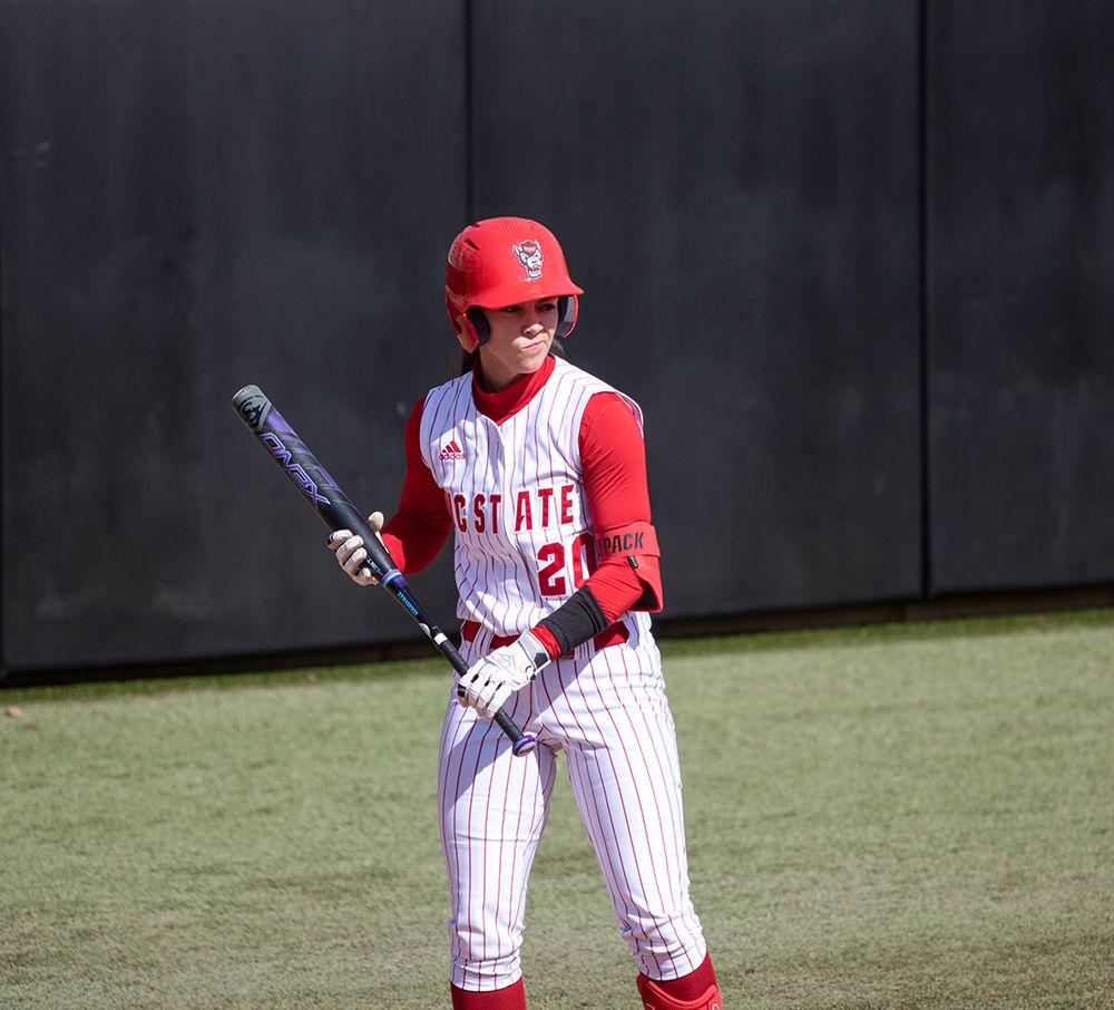 Sophomore Aprils Visser, walks up to bat on Friday, Feb. 28 at Dail Softball Stadium. Visser acted as a sacrifice hitter during her only at bat.