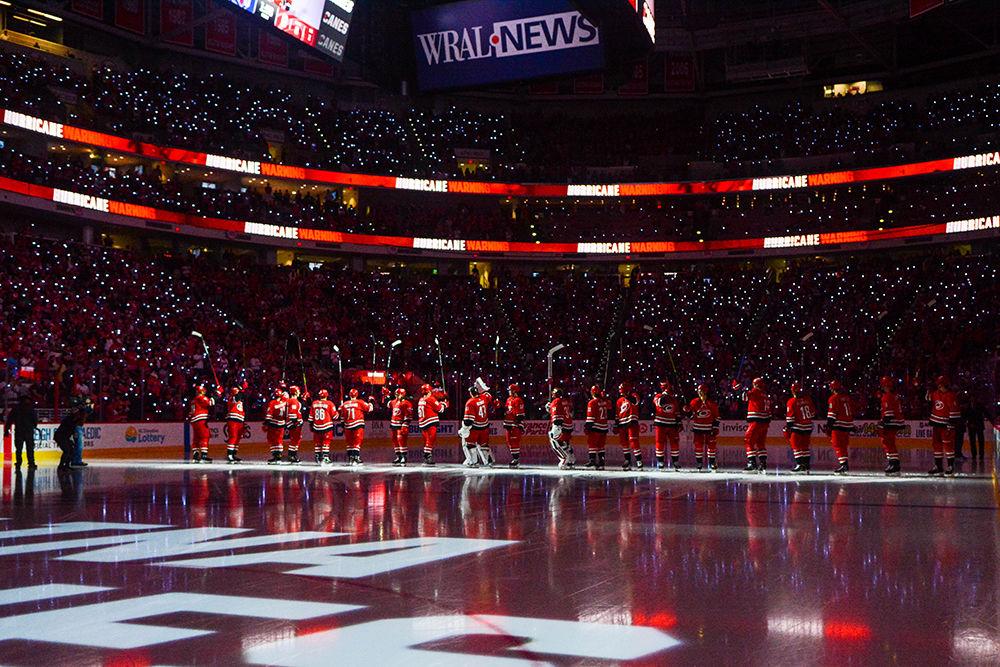 The Carolina Hurricanes wave to their fanbase during the first game of the NHL season versus the Montreal Canadiens on Thursday, Oct. 3, 2019 in PNC Arena. The Canes beat the Canadiens 4-3 after an overtime period and shootout.