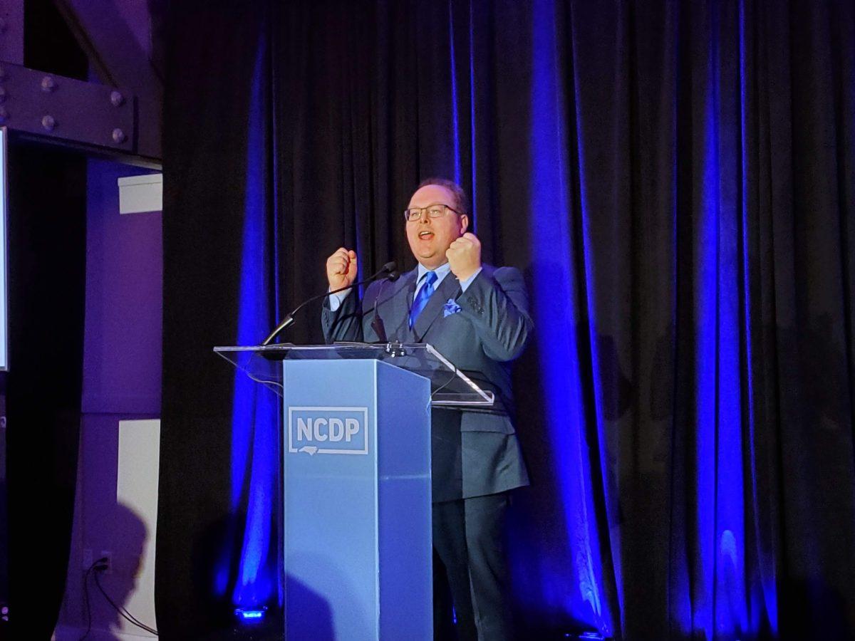 Wayne Goodwin, chair of the North Carolina Democratic party, speaks at the primary watch party at Traine Raleigh on Tuesday, March 3 2020.