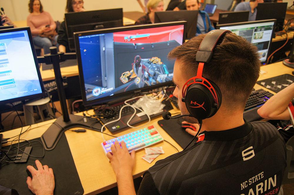 NC State team captain Preston "Soarin" Sorensen, a sophomore majoring in nuclear engineering warms up before the Overwatch match against UNC Saturday, Feb. 29, 2020, at the Frank Porter Graham Student Union. The NC State Overwatch team won 3-1 over UNC Esports.