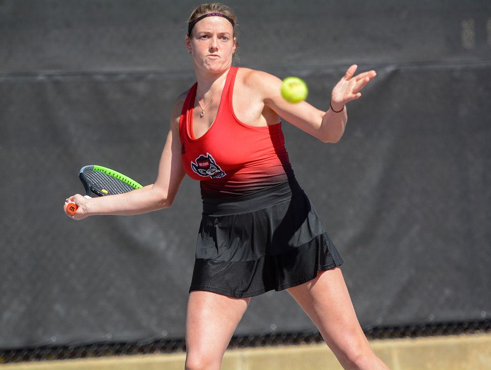 Anna Rodgers, a fourth year in business administration, looks to return the ball at the women's tennis match on Sunday, March 1, 2020 at J.W. Isenhour Tennis Center. Rodgers and Smith won their doubles match 6-2.