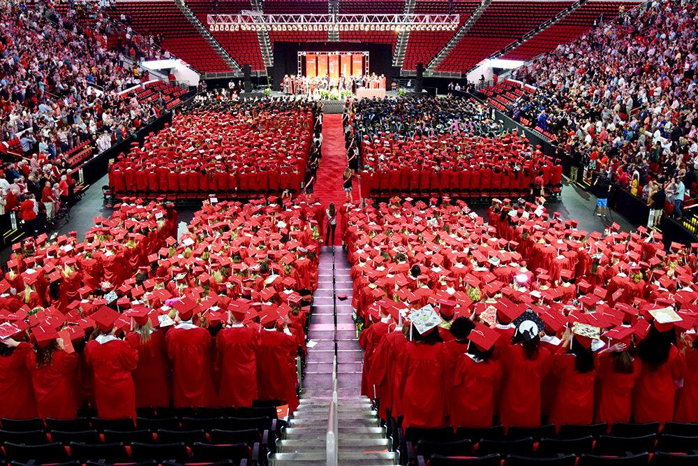 The Class of 2019 stand, preparing to process out of PNC Arena during the Commencement Ceremony on Saturday, May 11, 2019.