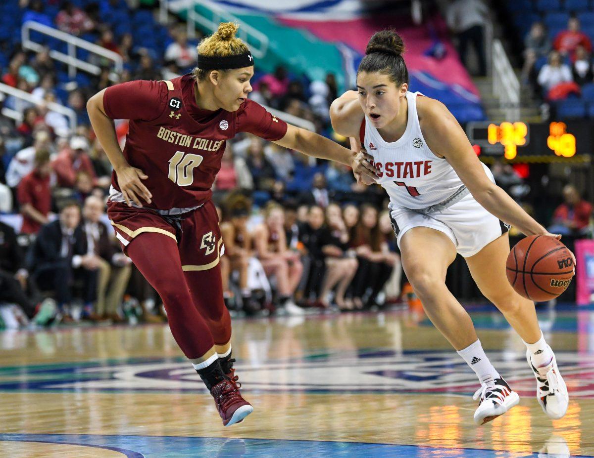 Senior guard Aislinn Konig puhes past the defense during the semifinal game of the 2020 ACC Women's Tournament versus the Boston College Eagles on Saturday, March 7, 2020 in the Greensboro Coliseum. Konig scored 16 points against Boston College. The Wolfpack beat the Eagles 82-75 to advance to the championship game against Florida State.