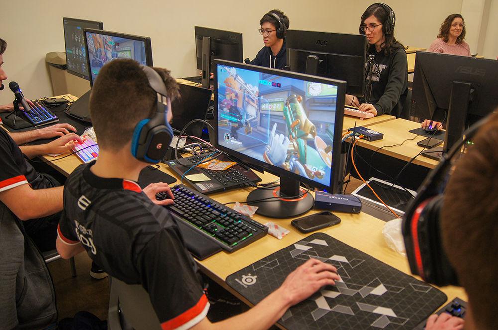 Patrick "SqiD" Miller, a sophomore majoring in electrical engineering plays Overwatch against UNC on Saturday, Feb. 29, 2020, at the Frank Porter Graham Student Union. The NC State Overwatch team won 3-1 over UNC Esports.