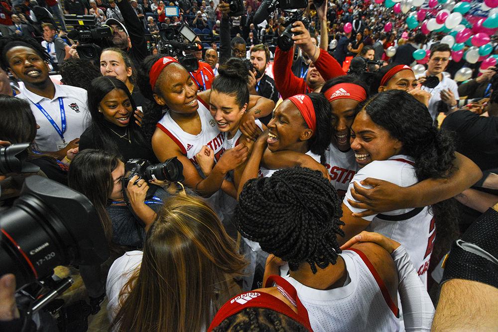 The NC State women's basketball team celebrates after the team won the 2020 ACC Women's Tournament on Sunday, March 8, 2020 in the Greensboro Coliseum.&#160;The Wolfpack beat the Seminoles 71-66 to win their first ACC title since 1991.