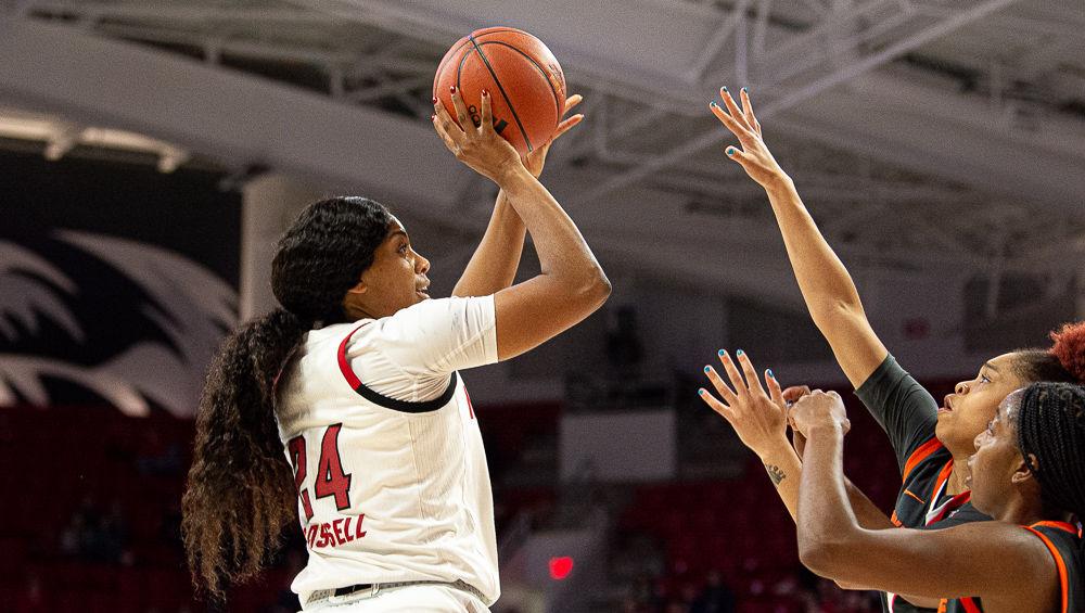 Senior center Erika Cassell shoots against Syracuse on Thursday, Feb. 27 at Reynolds Coliseum. Cassell recorded 12 points and nine rebounds as the Wolfpack won 69-60.