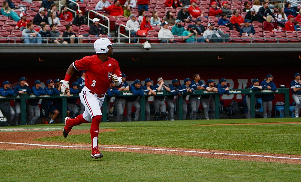 Junior infielder Devonte Brown watches as the ball he hits flies out of the field, giving him a 3-run home run against UNCW at Doak Field on Tuesday, Feb. 25, 2020. The Wolfpack beat the Seahawks 11-0.