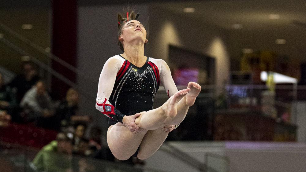 Freshman Emily Shepard performs her floor routine on Friday, Feb. 21 at Reynolds Coliseum. The Wolfpack took first place in the tri-meet against William &amp; Mary and Centenary with a score of 196.500.