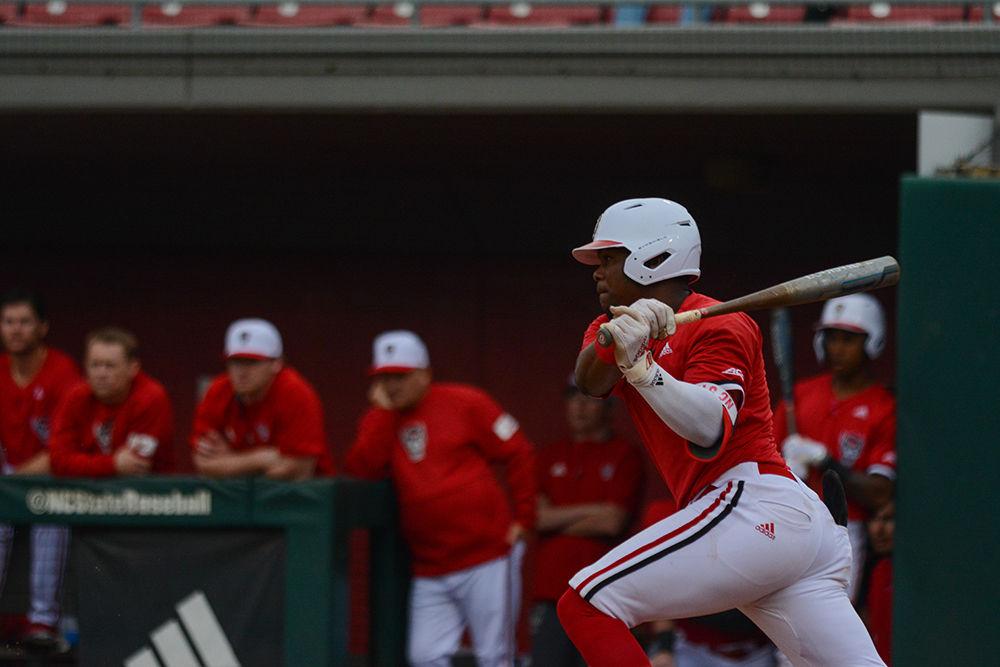 Junior infielder Devonte Brown swings during the game against UNCW at Doak Field on Tuesday, Feb. 25, 2020. Brown had one hit and two&#160; runs during the game. The Wolfpack beat the Seahawks 11-0.